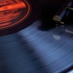 a record player spinning a record on a turntable